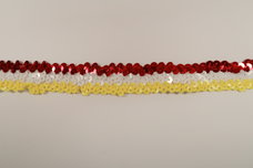 Oeteldonk pailletten elastiek, rood/wit/geel.