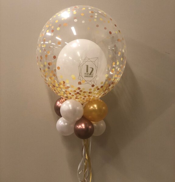 ballon 24 inch. met 11 inch ballon gevuld Helium.